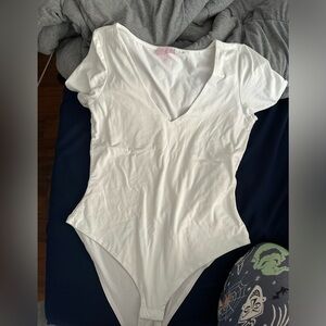 pink lily bodysuit/ size large